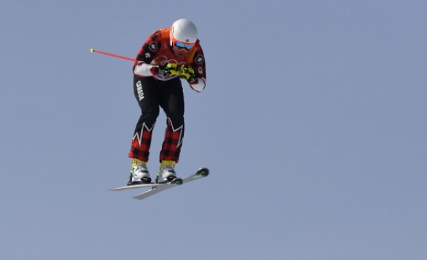 Канадският състезател по ски бягане Дейвид Дънкан съпругата и мениджърът