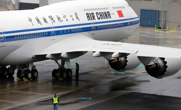 Самолет на китайската авиокомпания Чайна Еър летящ от град Чанша
