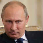 Секат монети с образа на Путин 
