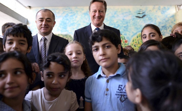 Великобритания няма да се присъедини към европейската политика за прием на мигранти