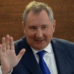 Рогозин се пошегува с вратовръзката си, след като Путин му направи забележка
