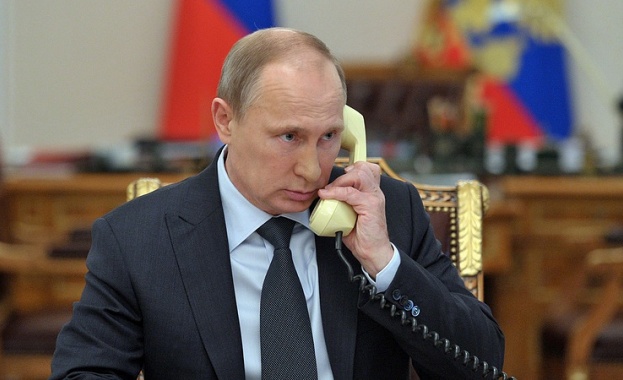 Путин обсъди ситуацията в Украйна с Меркел, Оланд и Порошенко