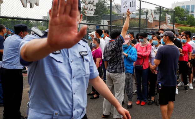 На жителите на 27 квартала в Пекин където има висок