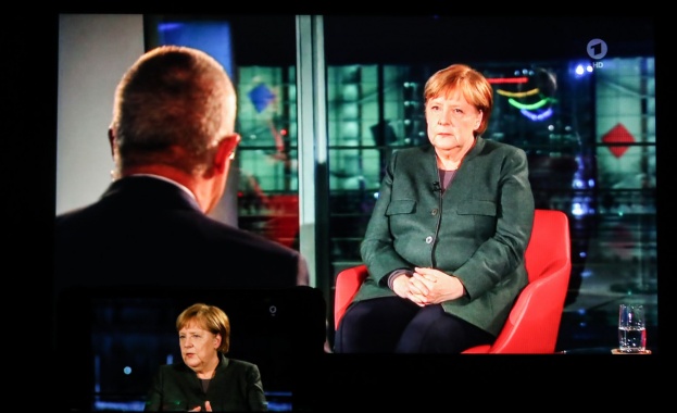 Ангела Меркел застана пред телевизионните камери за да отговаря на