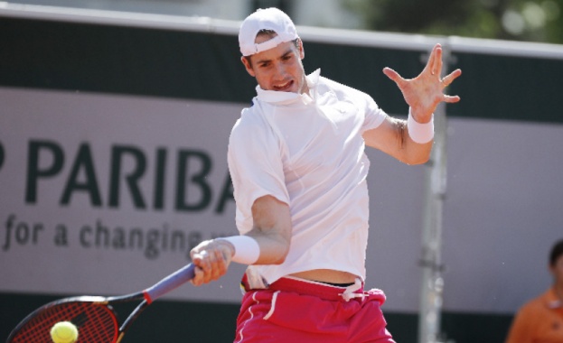 Четирикратният шампион и поставен под номер 2 в схемата Джон