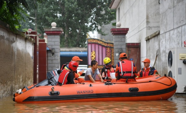 В Североизточен Китай продължават да се изсипват валежи след преминаването
